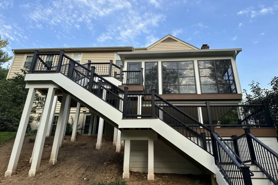 Velero Deck Designs' McLean project with elevated decks, connecting stairs and an enclosed screened porch